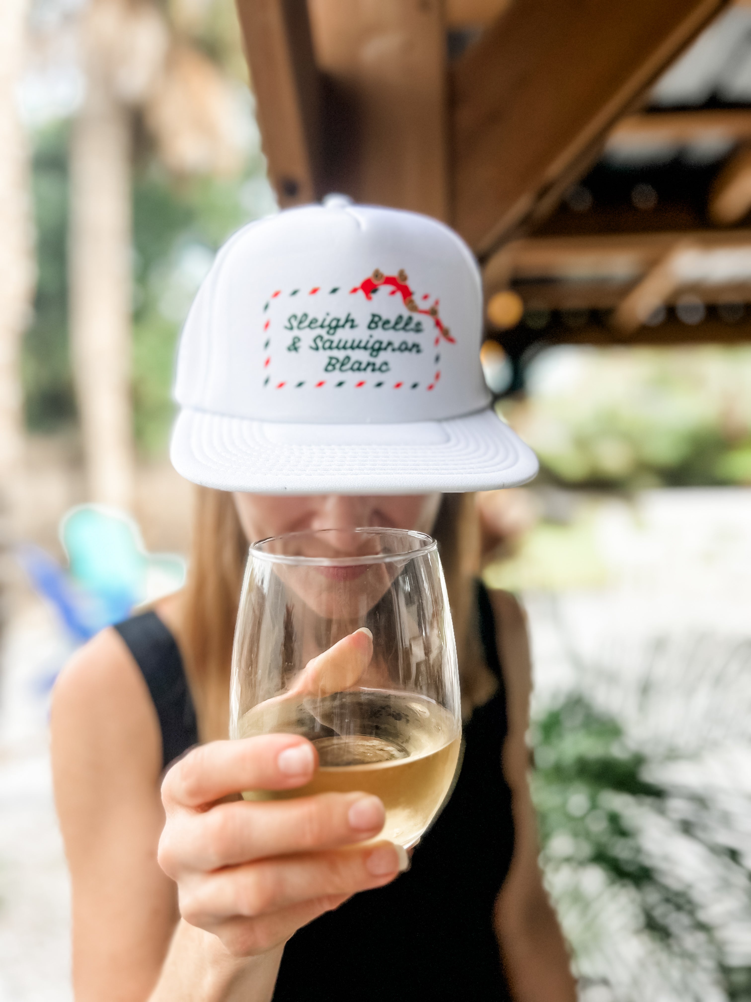 sleigh bells and sauvignon blanc corkie foam trucker hat perfect christmas or holiday gift for wine lover